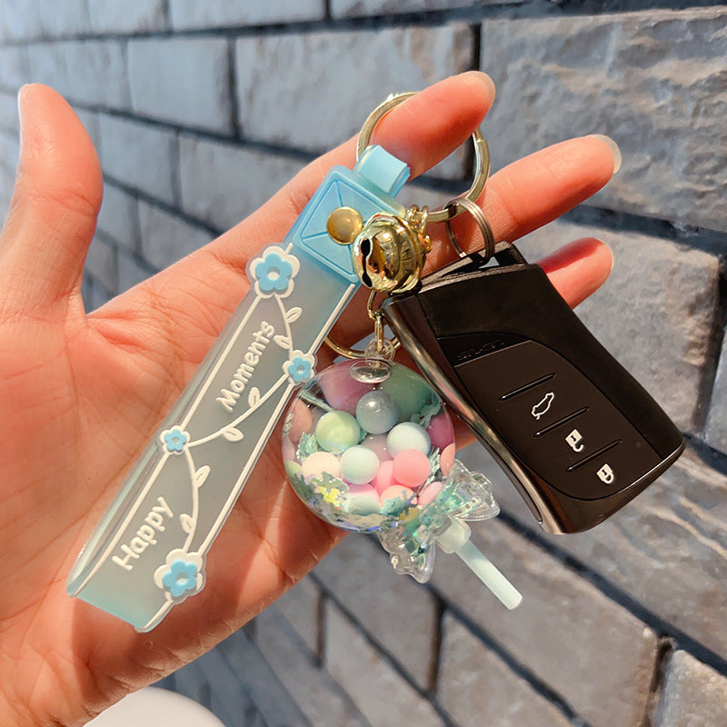 Piruleta de acrílico al por mayor en el llavero creativo de la arena movediza del aceite